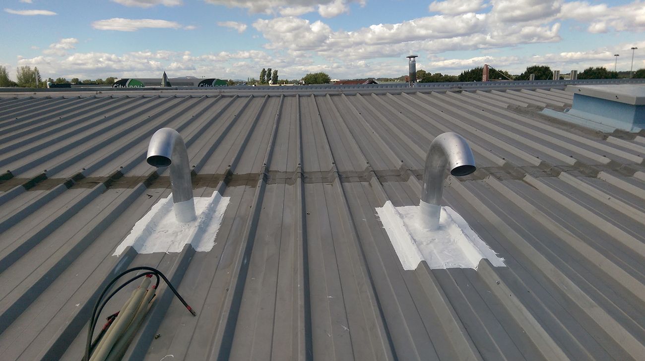 Sortie de toiture pour climatisation
